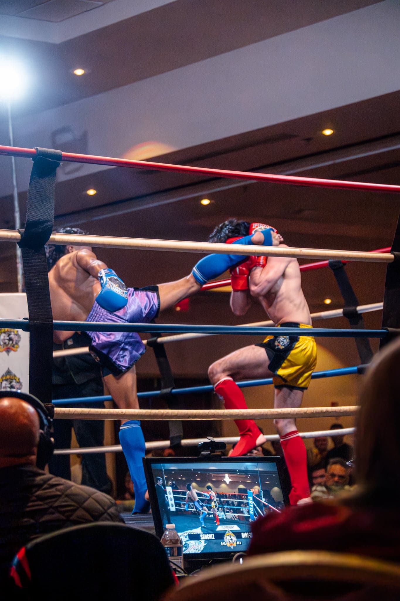 A kick landing during a muay thai bout