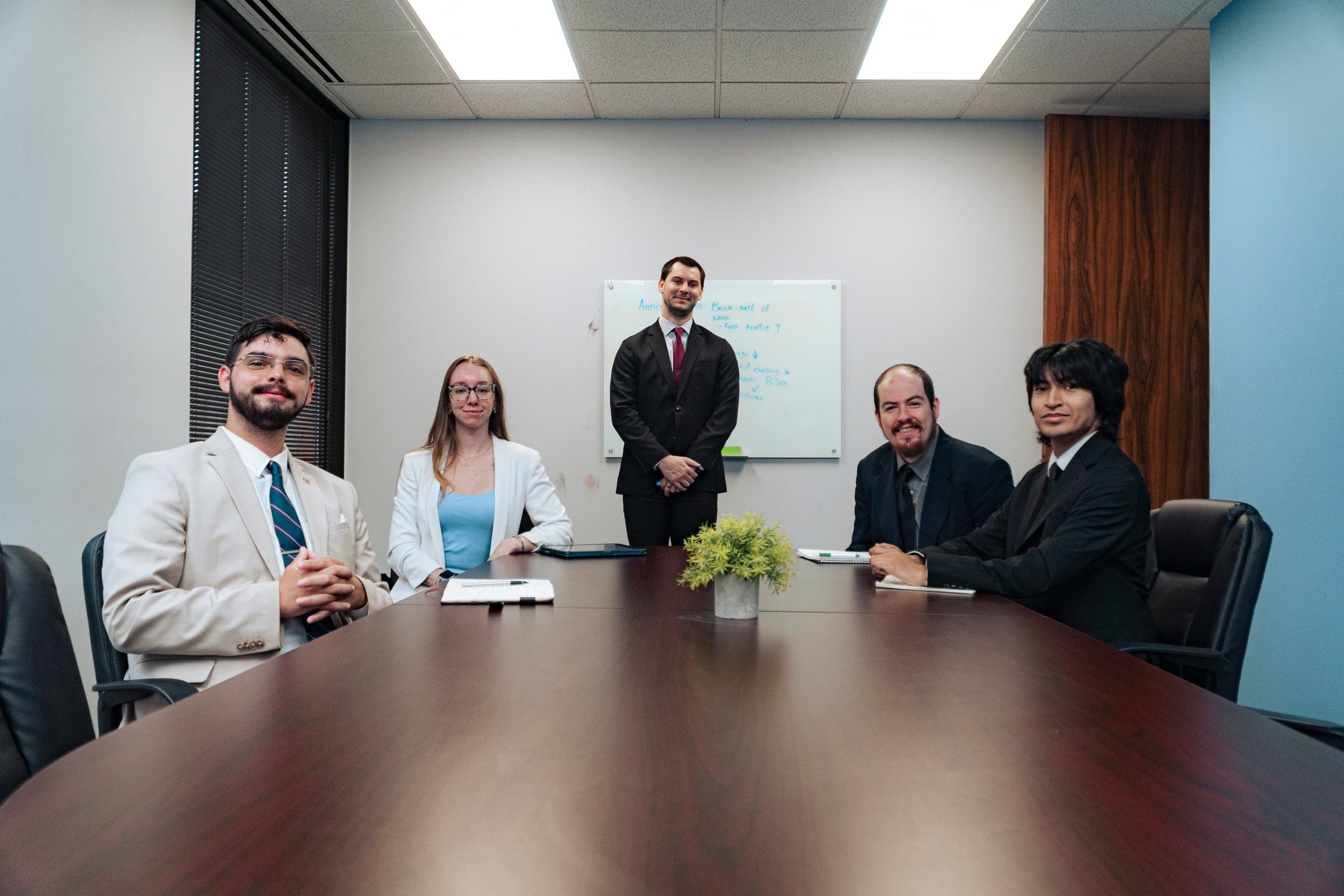 A team meeting in progress in a modern boardroom