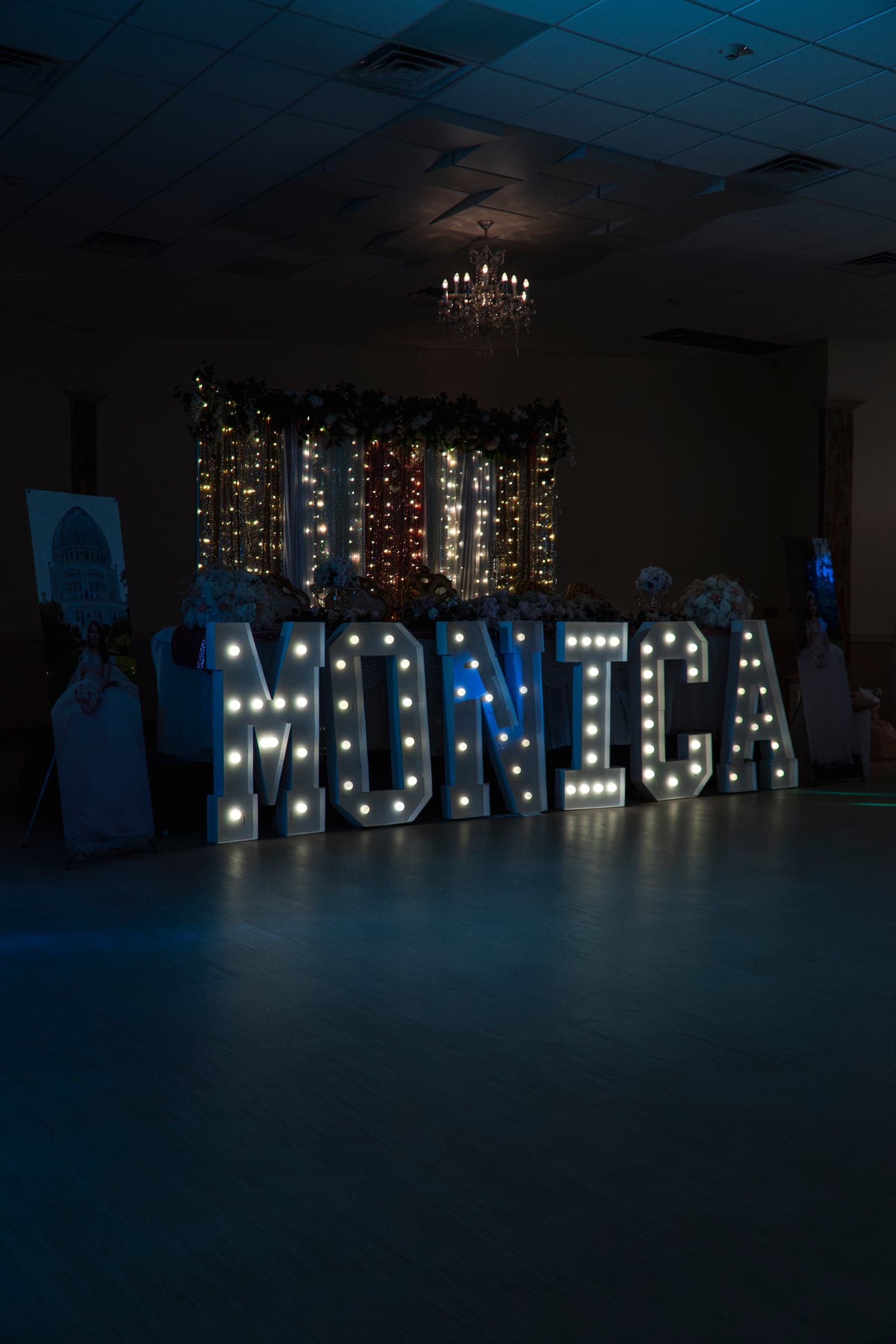 Illuminated marquee letters spelling the guest of honour's name on the dance floor