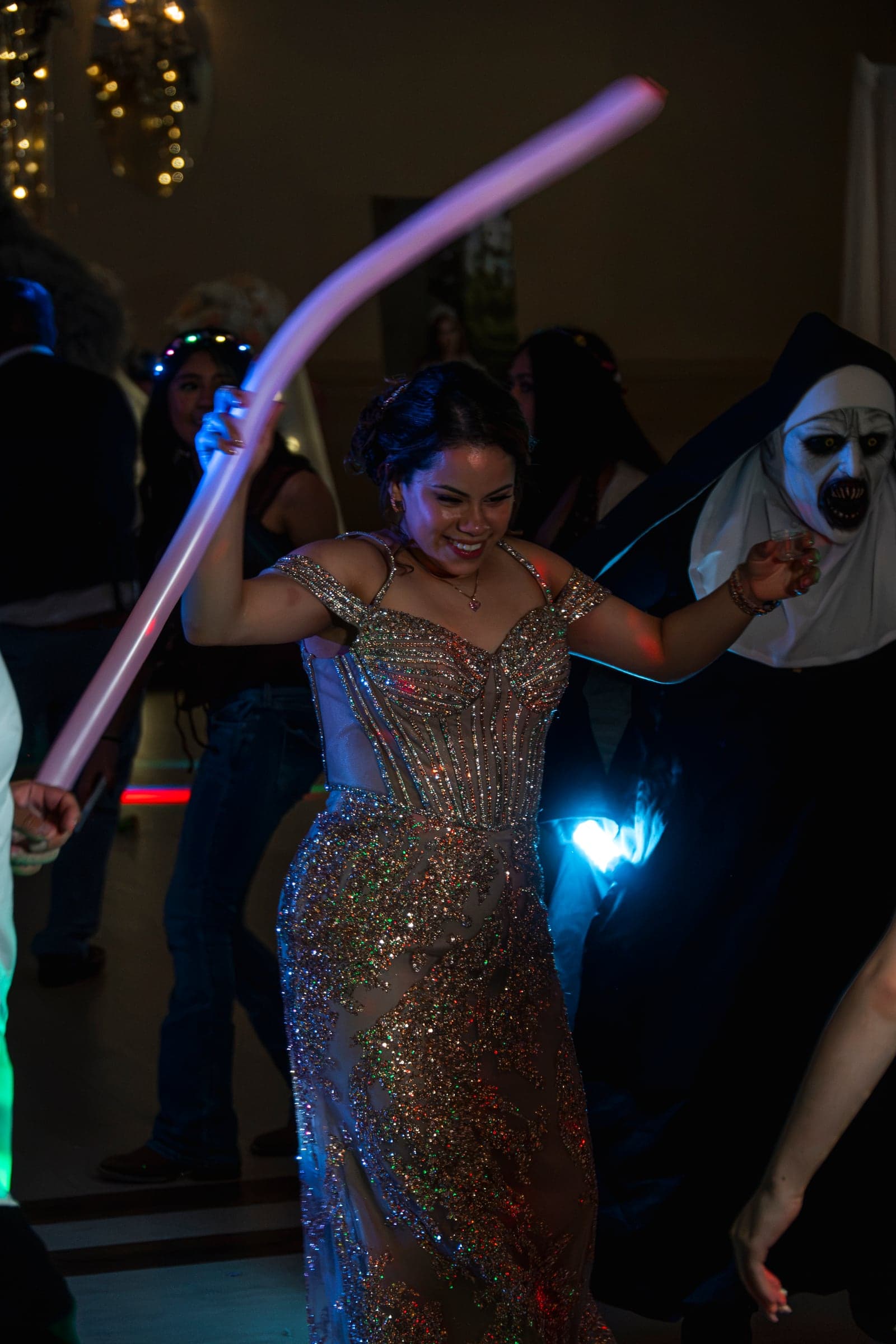 Dancing through the balloon drop at a Chicagoland quinceañera