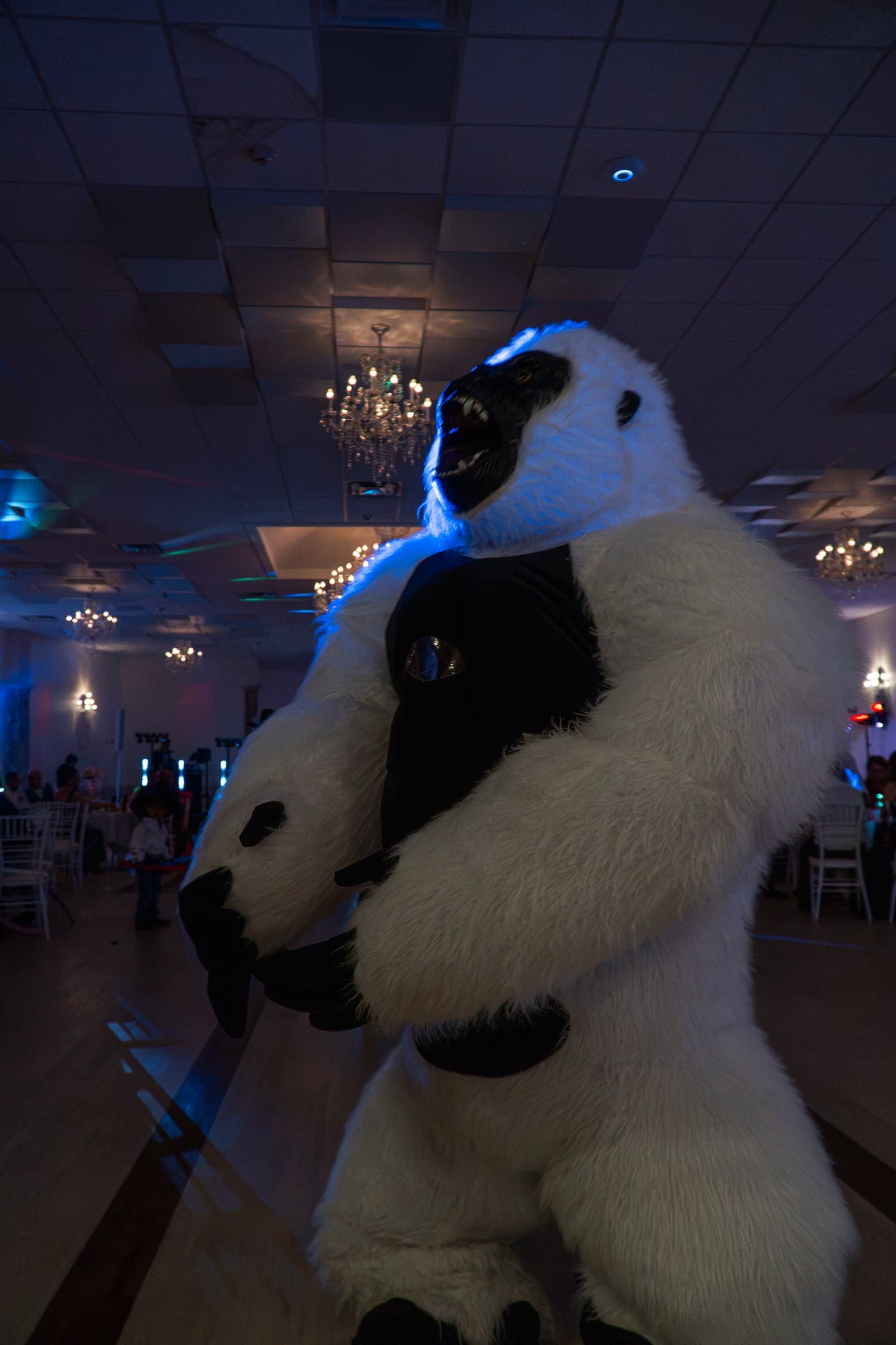 Costumed performers working the room at a quinceañera