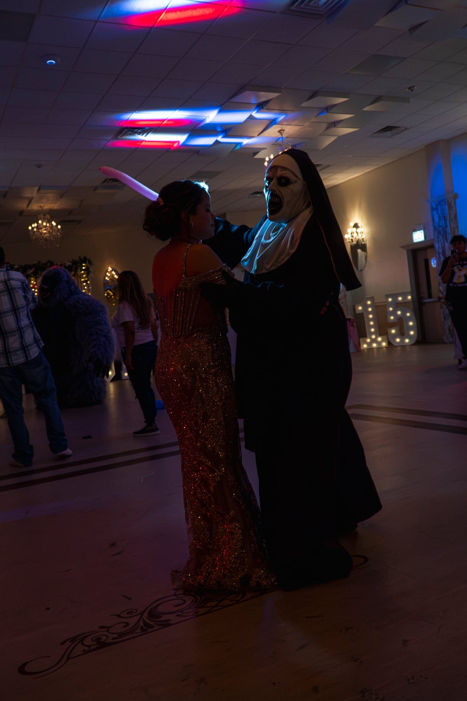 Dancing with a costumed performer as the party gets going